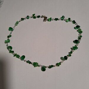 green different shaped beaded necklace with metal clasp